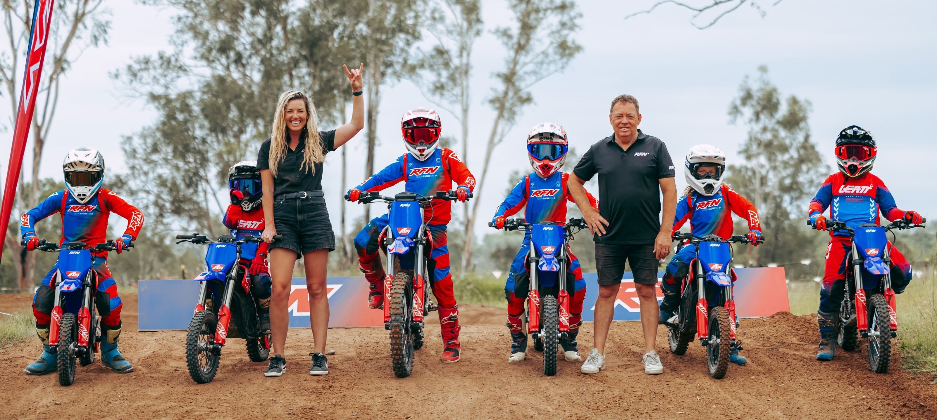 RFN riders and team members together with a range of electric dirt bikes